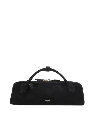 Alaïa Teckel Suede Clutch In Black