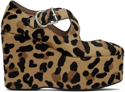 ALAÏA BROWN CRISS CROSS WEDGE HEELS