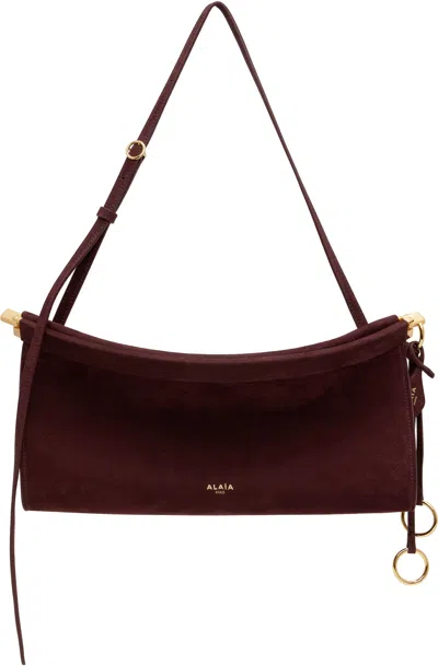 Alaïa Burgundy 'le Click' East West Medium Bag