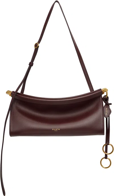 Alaïa Burgundy 'le Click' East West Small Bag