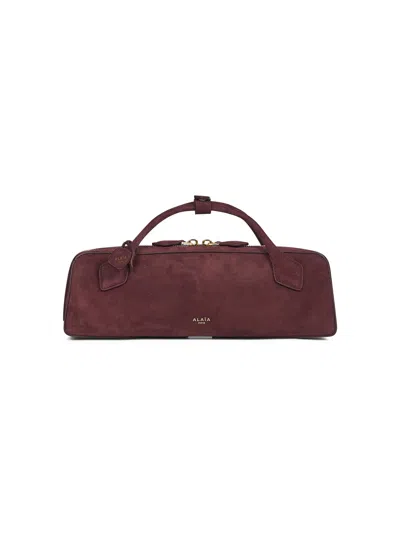 Alaïa Burgundy Le Teckel Clutch Bag