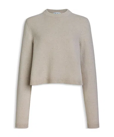 ALAÏA CASHMERE AND WOOL TURTLENECK PULLOVER