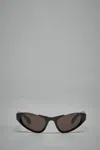 Alaïa Cat Eye Sunglasses In Brown