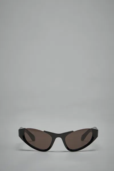 Alaïa Cat Eye Sunglasses In Brown