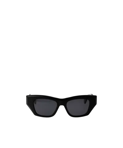 Alaïa Cat-eye Sunglasses In Black