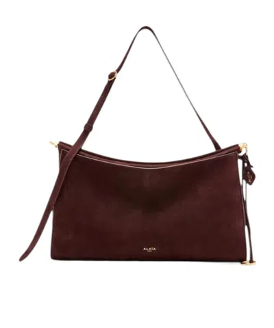 Alaïa Click Pocket Shoulder Bag In White