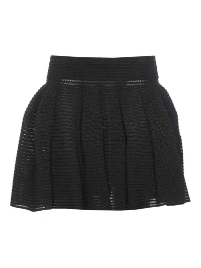 ALAÏA FALDA SEMILARGA - NEGRO