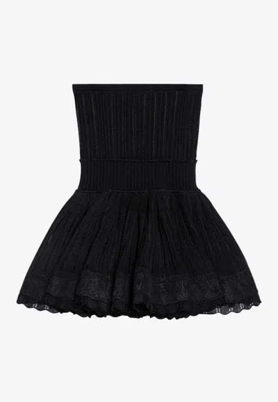 Alaïa Crinoline Strapless Peplum Top In Black
