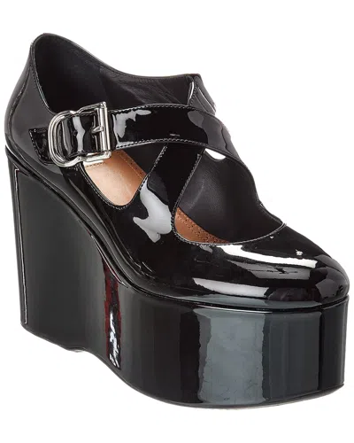 Alaïa Criss Cross Patent Wedge Pump In Black
