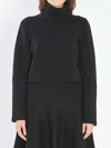 Alaïa Cashmere Blend Cropped Turtleneck Pullover In Black