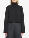 Alaïa Cashmere Blend Cropped Turtleneck Pullover In Black