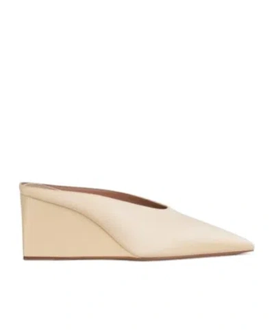 Alaïa Alaia Sand Bucket Wedge Mules In Neutral