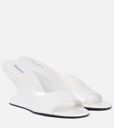 Alaïa Curve 75 Patent Leather Wedges In White
