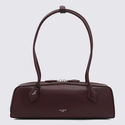 Alaïa Dark Red Leather Teckel Medium Shoulder Bag In Burgundy
