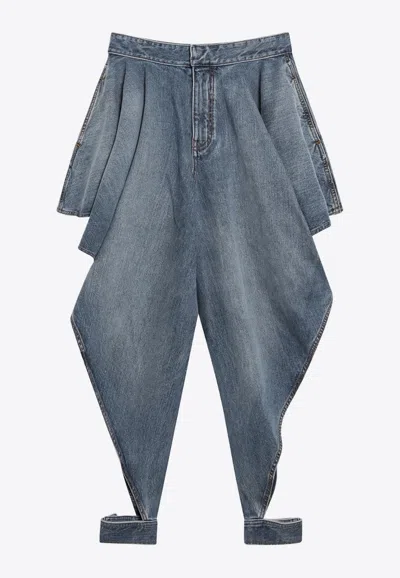 Alaïa Dé Lavé Paneled Jeans In Blue