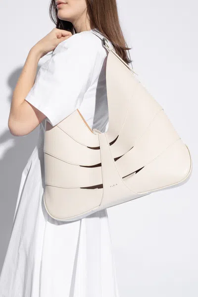 Alaïa Delta Cut Out Detailed Tote Bag In Cream
