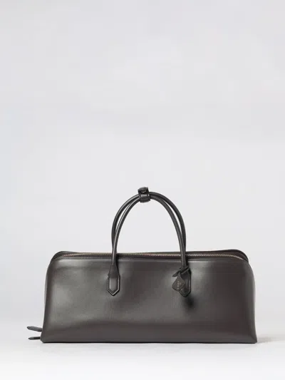 Alaïa Delta Medium Calfskin Leather Handbag With Logo Charm In Brown