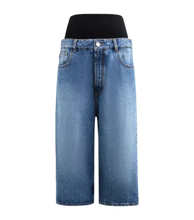 ALAÏA DENIM KNITTED-BAND BERMUDA SHORTS