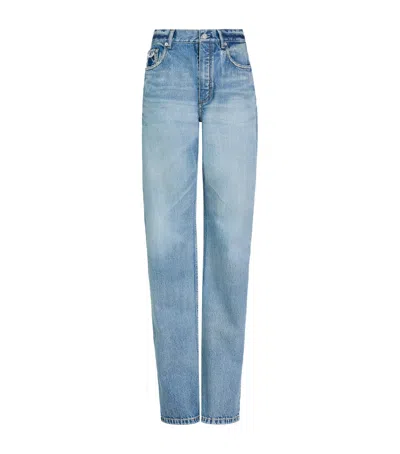 Alaïa Distressed Mid-rise Straight Jeans In Blue