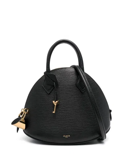 Alaïa Dome 25 Leather Handbag In Black