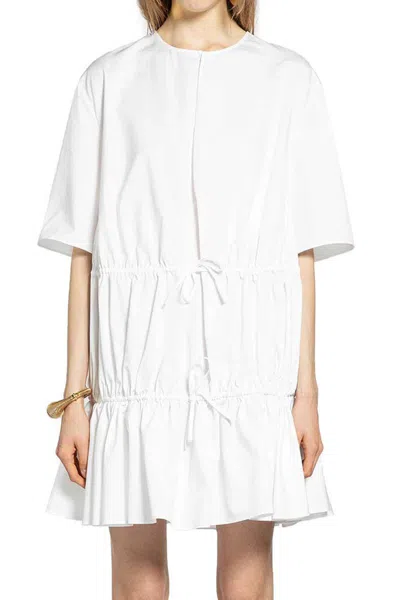 Alaïa Dresses In White