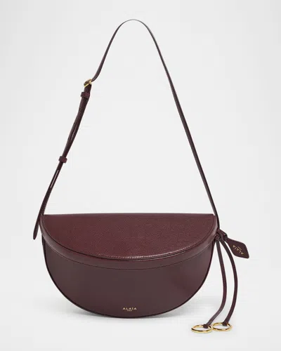 Alaïa East-west Curved Goatskin Leather Shoulder Bag In Red
