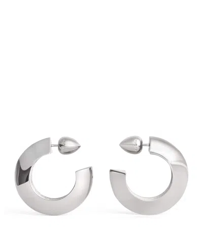 Alaïa Edge Hoop Earrings In Metallic