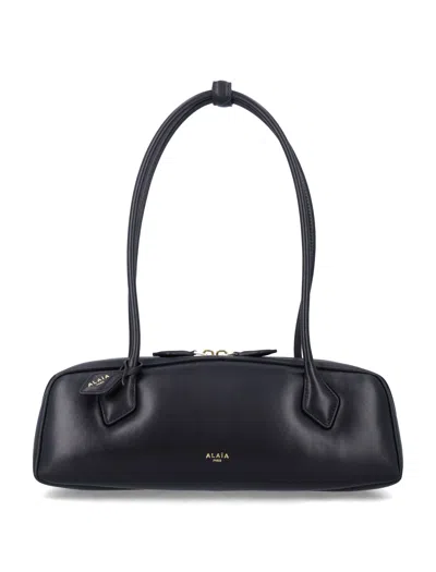 Alaïa Alaia Elegant Medium Handbag - Sculptural Silhouette In Purple