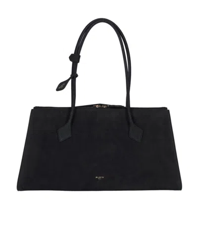 Alaïa Le Teckel Shoulder Bag In Grained Leather In Noir