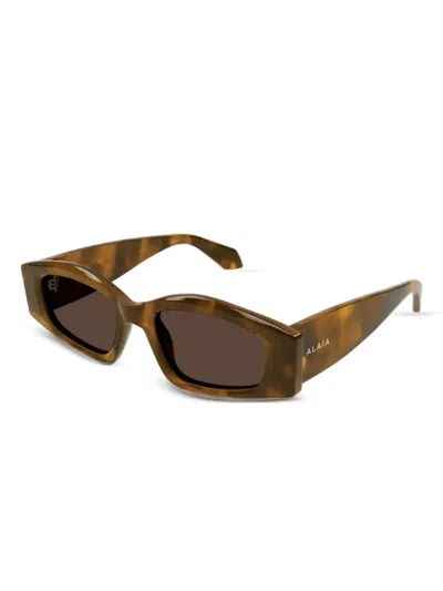 Alaïa Eyewear Geometrische Sonnenbrille In Braun