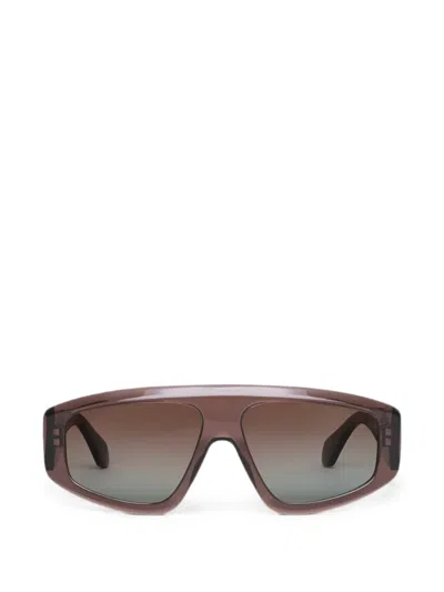 Alaïa Eyewear Sonnenbrille Mit Geometrischem Gestell In Braun