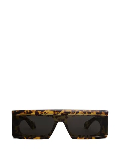 Alaïa Eyewear Sonnenbrille Mit Eckigem Gestell In Braun