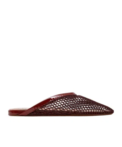 Alaïa Fishnet Flat Mules In Red