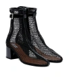 Alaïa Fishnet Patent Leather-trimmed Ankle Boots In Black