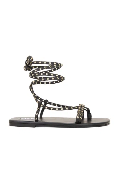 Alaïa Flat Strappy Sandal In Noir