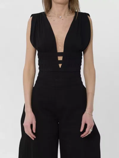 Alaïa Fluid Jersey Bodysuit Deep V Neckline In Black