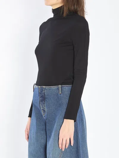 ALAÏA FLUID JERSEY BODYSUIT WITH HEART CUT-OUT