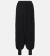 Alaïa Fringed Knit Jogger Pants In Black