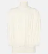 Alaïa Fringed Wool Turtleneck Sweater In White