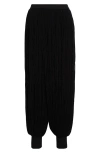 Alaïa Fringed Knit Jogger Pants In Noir Alaia