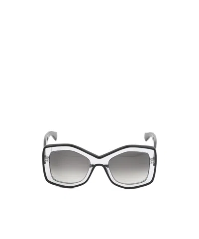 Alaïa Geometric Frame Sunglasses In Gray