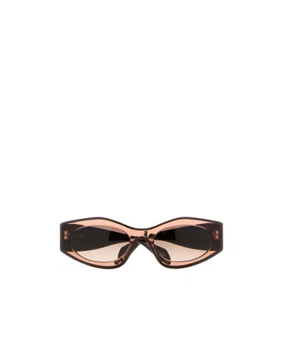 Alaïa Geometric Sunglasses In Brown