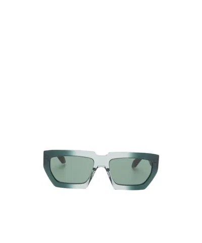 Alaïa Geometric Sunglasses In Green