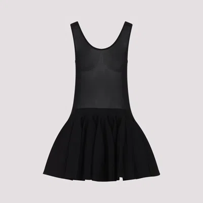 Alaïa Knitted Minidress In Noir Alaia