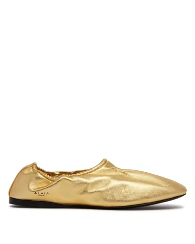 Alaïa Gold Leather Flat Ballerinas