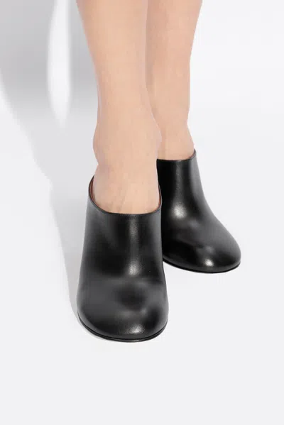 Alaïa Heeled Mules In Black