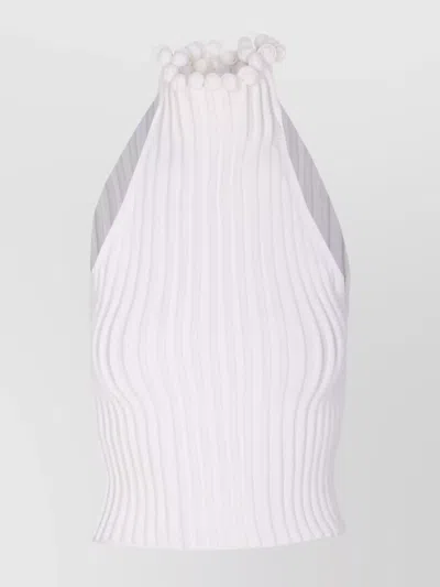 ALAÏA HIGH NECK SLEEVELESS HALTER TOP WITH POM-POM