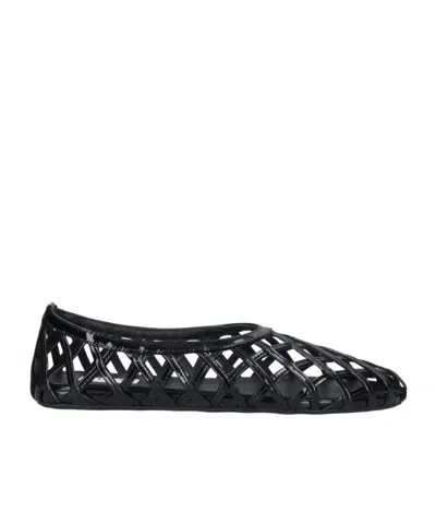 Alaïa Hollow Flat Shoes In Black