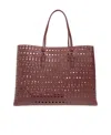 Alaïa Hollowed-out Shoulder Bag In Red
