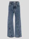 Alaïa Twisted Stonewashed Denim Jeans In Blue